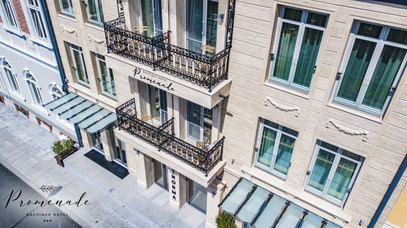 Facade with wrought-iron balconies of Promenade Boutique Hotel in Burgas